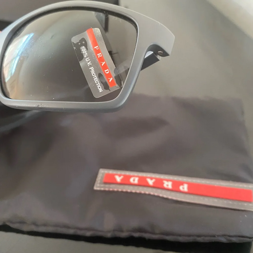 prada 100%UV protection sunglasses with the bag and box - Picture 3 of 6